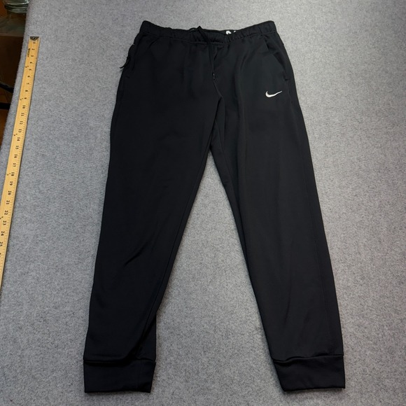 Nike Men's Pants Therma-FIT Tapered Black Fleece L 32x28 Relaxed Zip Pocket - Picture 1 of 8